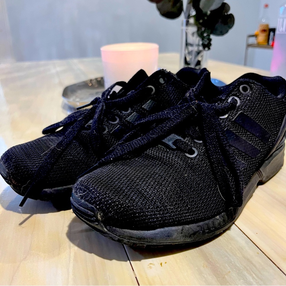 Black Adidas Sneakers in Fair Condition. Very comfortable and supportive.